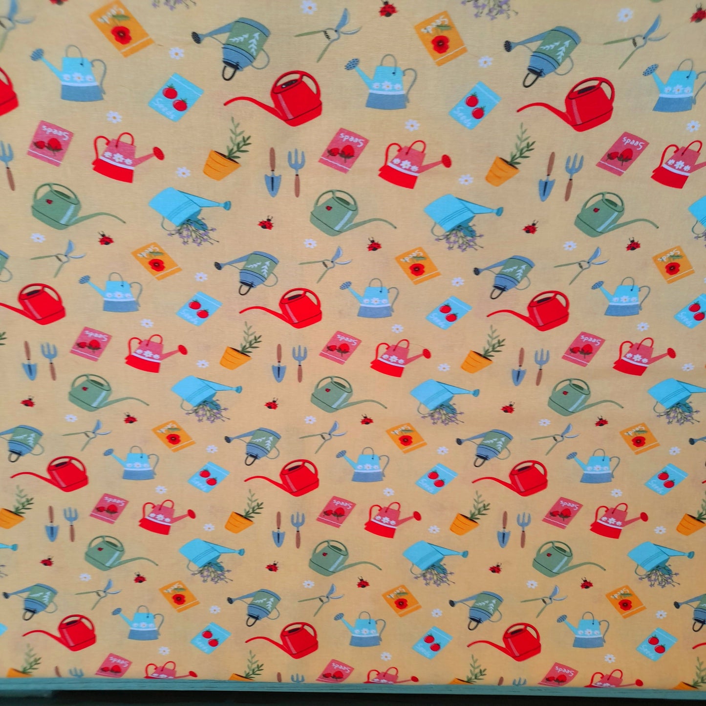 In the Garden - Watering Cans