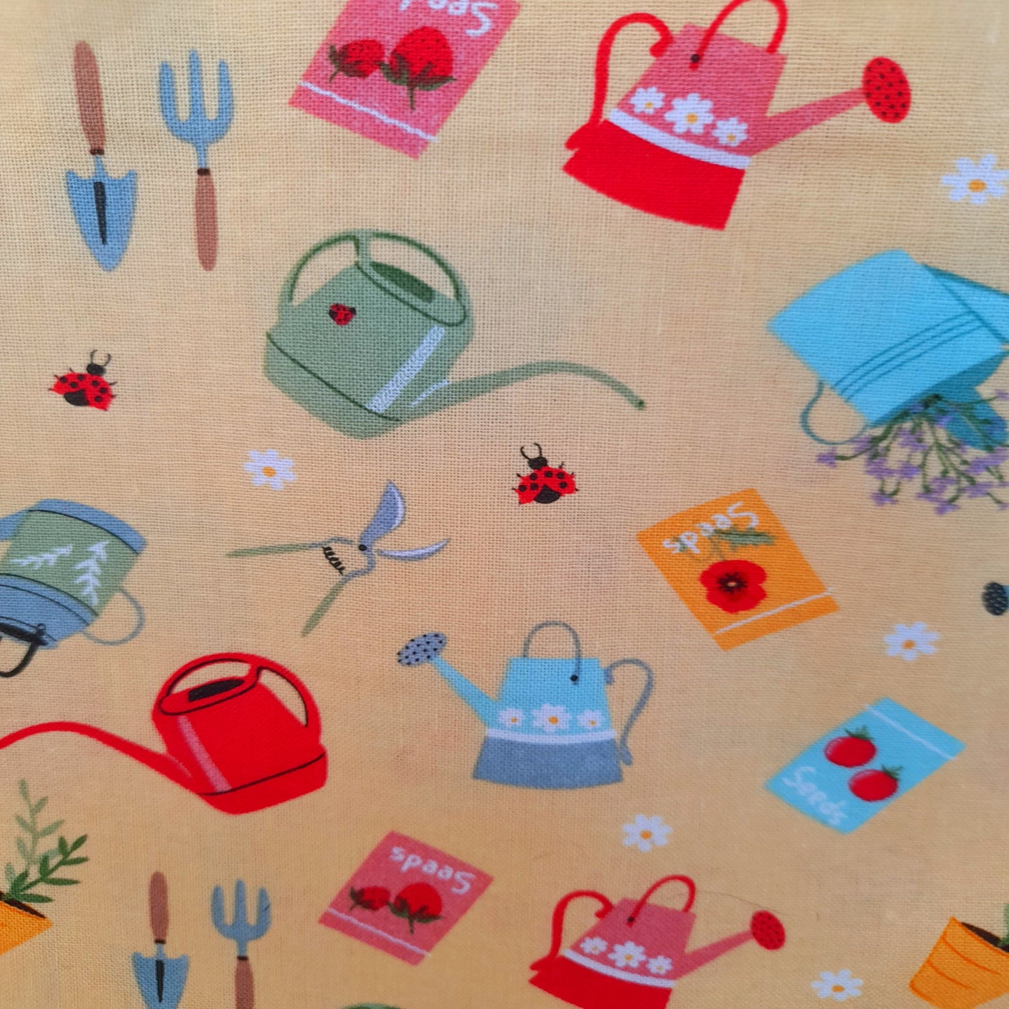 In the Garden - Watering Cans