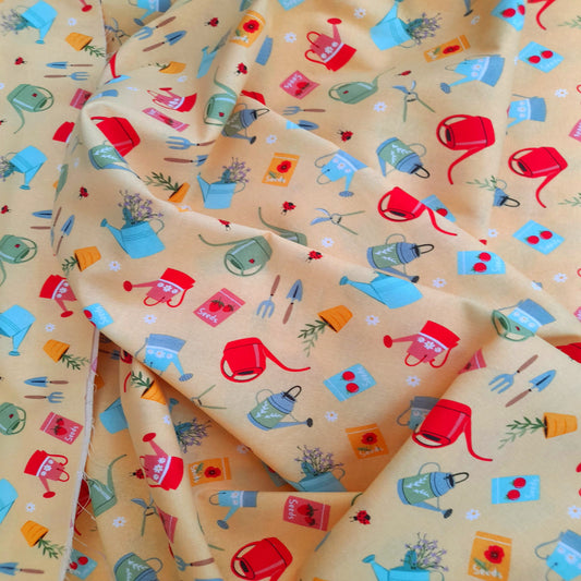 In the Garden - Watering Cans